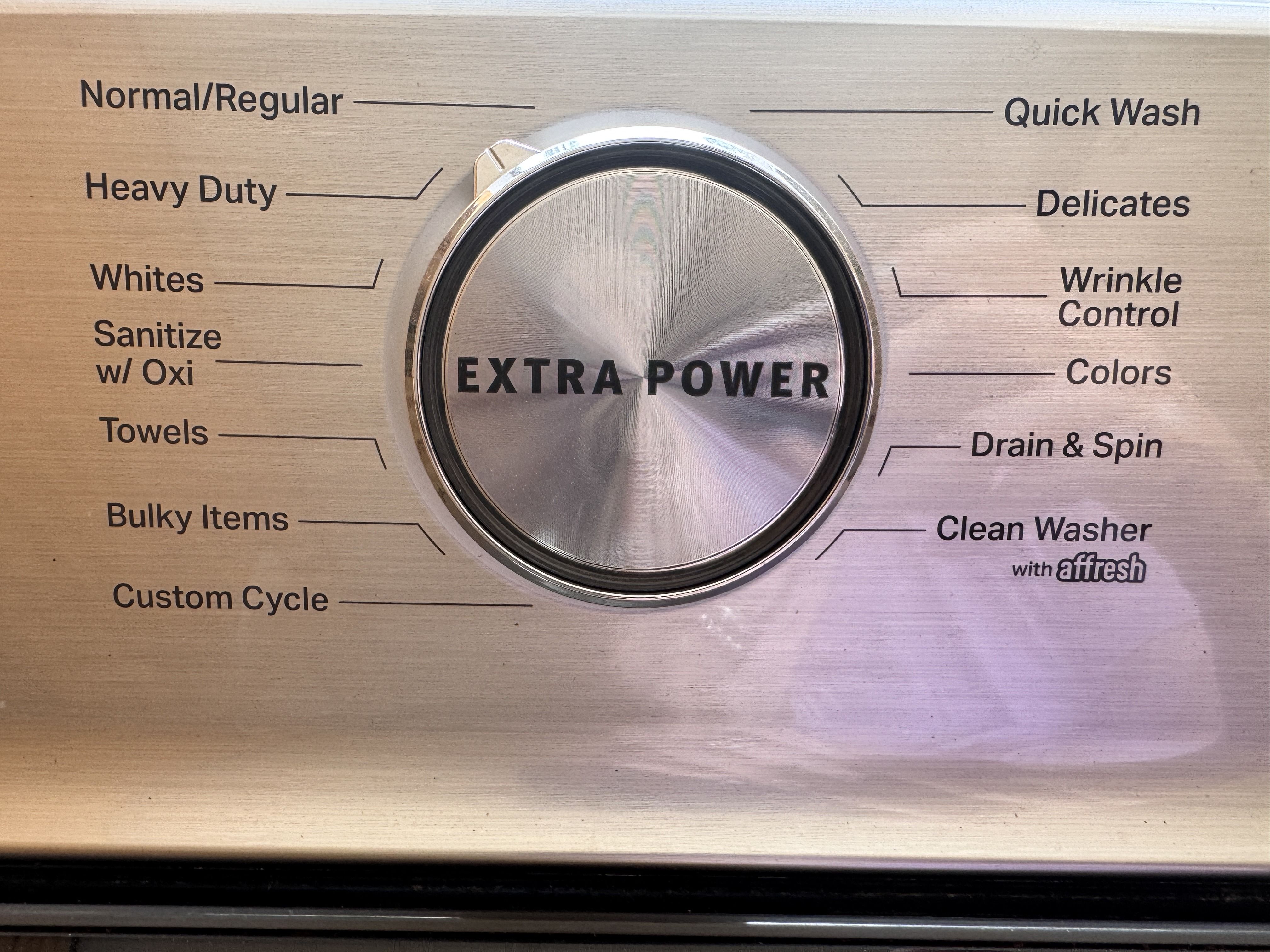 Cycle-selector knob with EXTRA POWER button in the center, cycle names around it