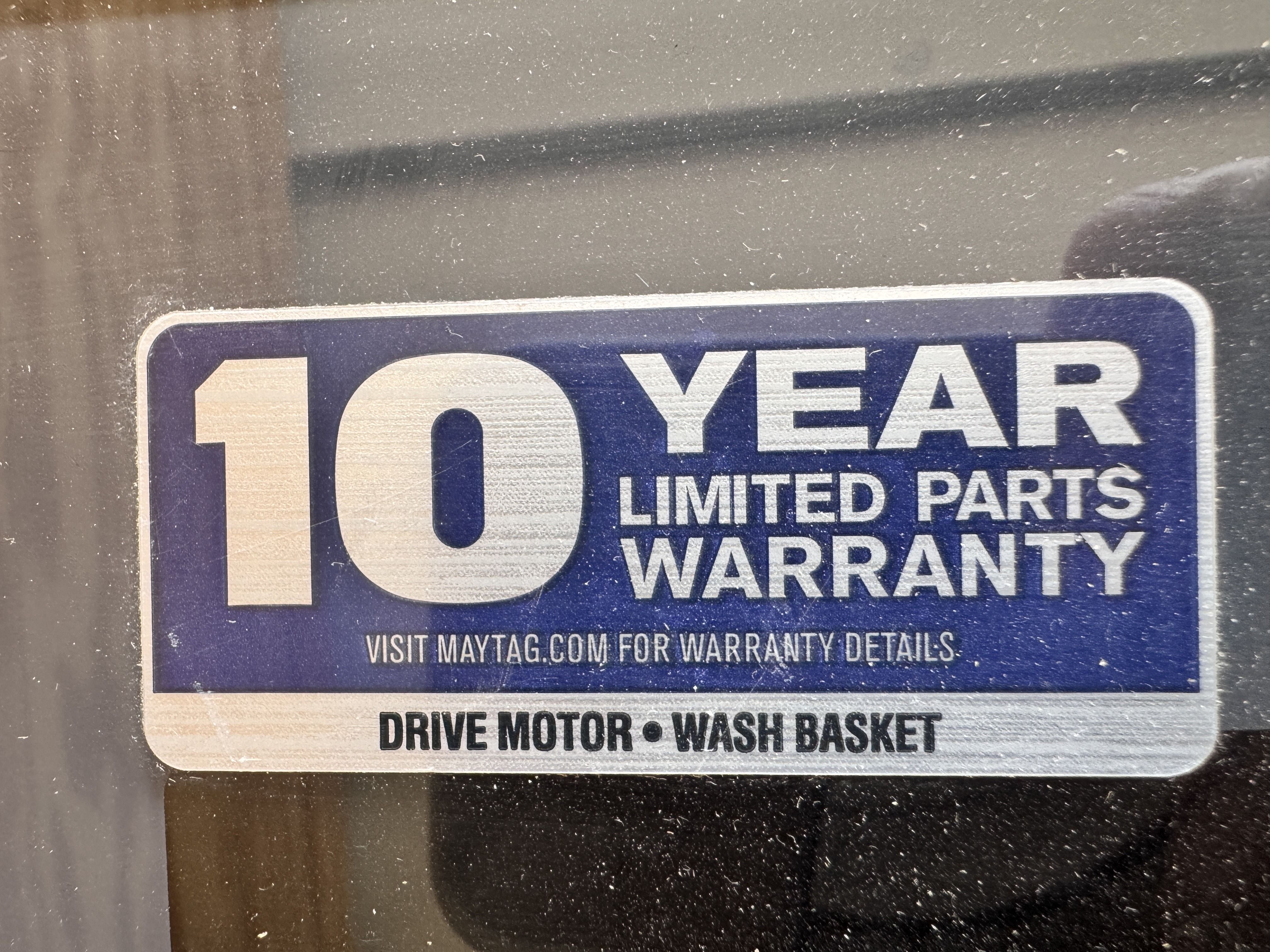 10 Year Limited Parts Warranty sticker: covers Drive Motor and Wash Basket only